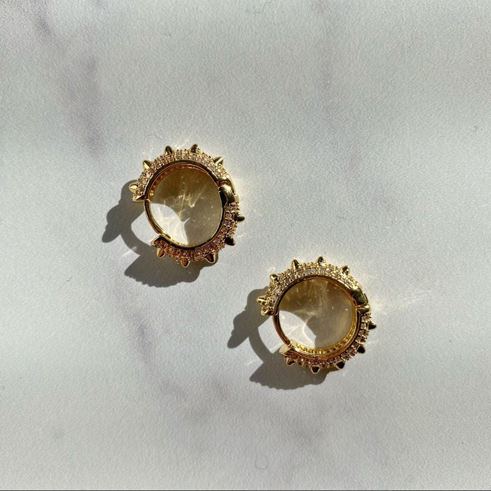Golden crystal studded loop earrings